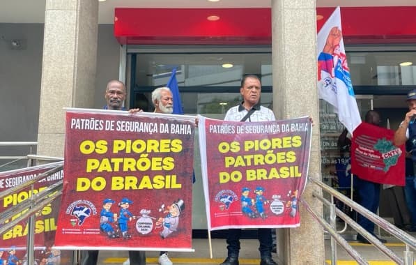 Sindicato dos vigilantes realiza protesto em agência bancária na Avenida Tancredo Neves